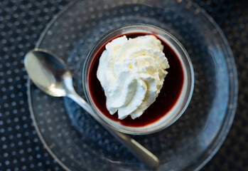 Sweet whipped wild berry mousse served in bowl for dessert