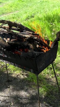 Closeup view of fire burning in the grill.