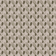 Seamless Pattern with Elegant Green Leaves on Beige Background