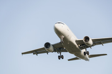 Close-up of an approaching passenger airplane preparing to land.
