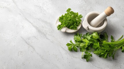 Fresh parsley arrangement with mezzaluna chopper and sauce dish on stone background