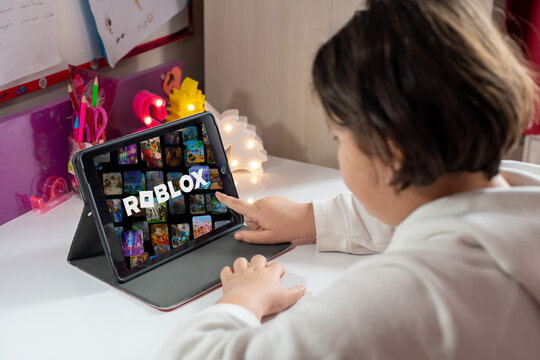 Antalya, Turkey - May 23, 2025: Little girl playing Roblox, a game very popular among children