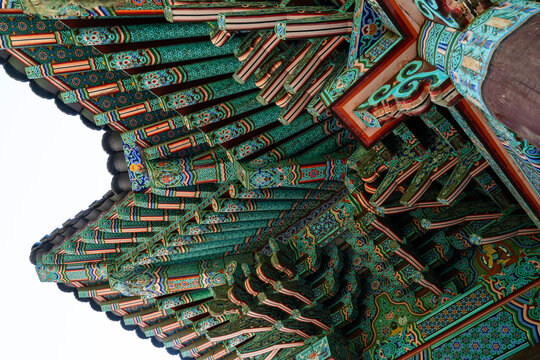 painted eaves of the traditional Korean building in the Buddhist temple