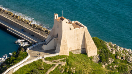 Fototapeta premium Aerial view of the tower on the Sperlonga seafront. This attraction is a symbol of the town in the province of Latina, Lazio, Italy.