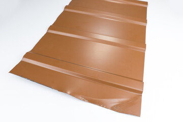Metal siding on the wall. Wood imitation