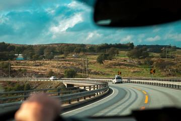 view from the windshield of the car on the road.through the mountains