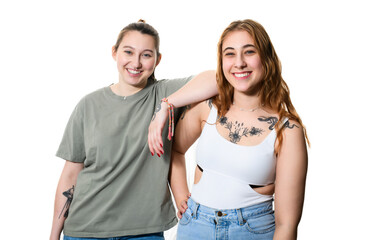 Fototapeta premium Happy lesbian couple on studio white background. Romantic young LGBTQ+ couple together.