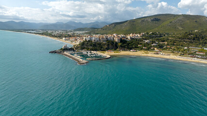 Aerial view of the town of Sperlonga, in the province of Latina, Lazio, Italy. The village is built on a promontory overlooking the Mediterranean Sea.
