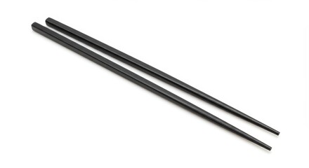 Photo of Black Chopsticks Pair on White Background Isolated Top Angle View