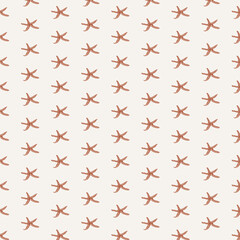  Seamless pattern with starfish,cute pattern with cartoon starfish on  the beige background .