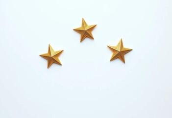 Obraz premium Three gleaming gold stars on pure white background, minimalist design, rating, glittering