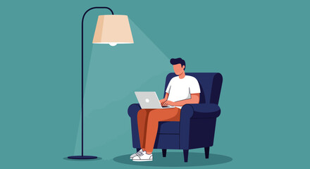 A Person Working on Laptop Under a Lit Floor Lamp in a Cozy Chair