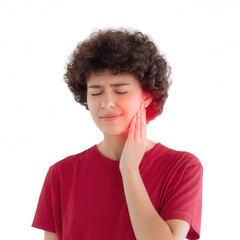 A young person with curly hair expressing discomfort, holding their jaw due to tooth pain, isolated on a white background.