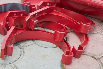 hooks for fastening a gutter, for fastening hook garden to drain roofs. red bracket . Brackets of...