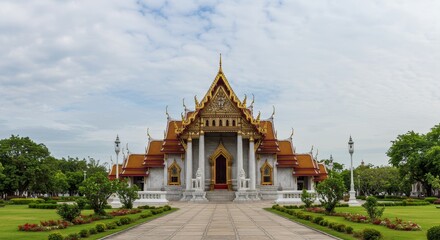 Naklejka premium Photo of Marble Temple Architecture in Bangkok Thailand under a Cloudy Sky