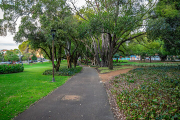 Paved Footpath Surrounded by Lush Greenery and Majestic Trees in Hyde Park, Perth, Australia, 12 April 2020