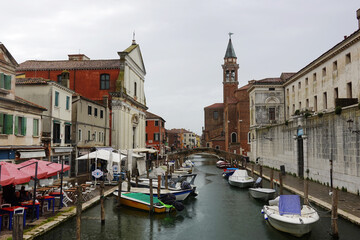 Fototapeta premium Old canals and streets in Chioggia, Italy