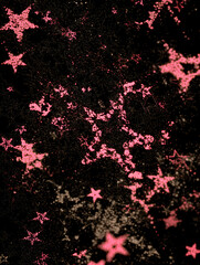 Background filled with hundreds of bright pink stars in various shapes and sizes against black backdrop
