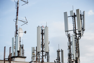Telecommunication antennas against blue sky