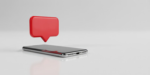 Smartphone receiving notification with a red message bubble on a minimalistic surface