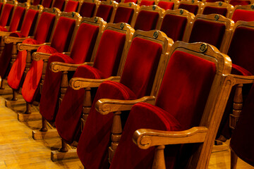 Row of red seats in theatre