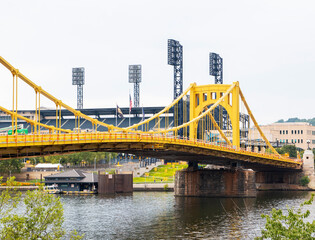 Yellow Bridge Connects Two Banks Near Pittsburgh Pirates Sports Stadium