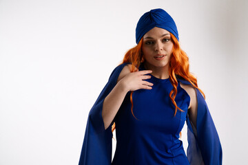 Fashionable Woman in Blue Dress and Orange Hair Style