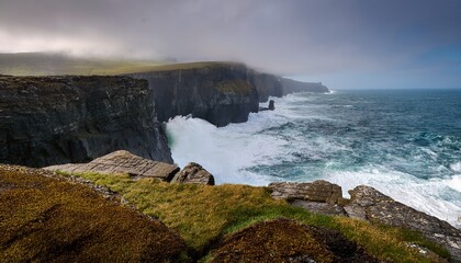 dramatic coastal cliffs with crashing waves under a misty sky showcasing nature s power and beauty
