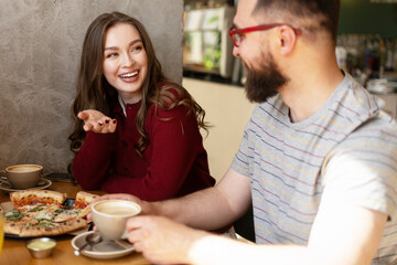 Friends Enjoying Coffee and Pizza Together