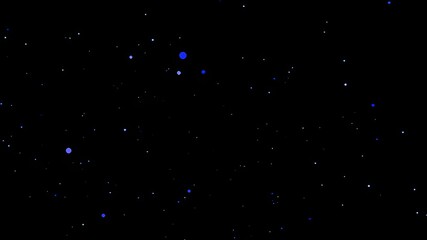 Scattered light particles against a black background.