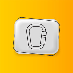 Black Carabiner icon isolated on yellow background. Extreme sport. Sport equipment. Silver rectangle button. Vector