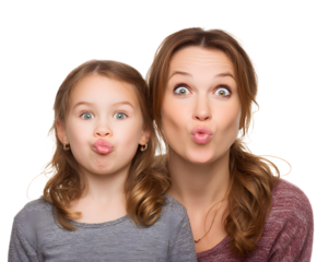 A mother and daughter share a silly moment together, making funny faces for the camera.