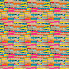 Layered torn colorful paper seamless tileable pattern
