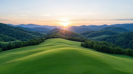 Fototapeta premium Serene Sunset Over Rolling Green Hills