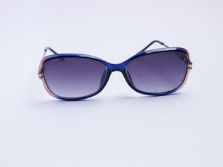 Elegant fashion sunglasses with gradient lenses and stylish red-blue frame, isolated on white...