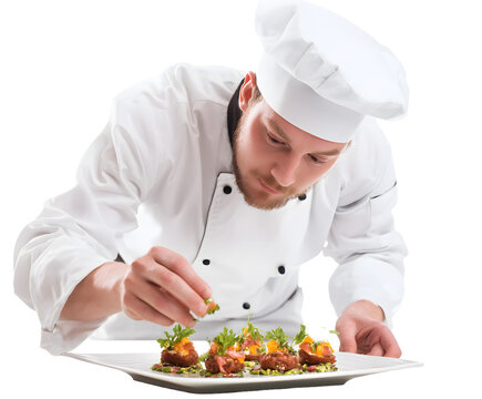 A skilled chef carefully plates an assortment of gourmet appetizers with fresh garnishes for service.