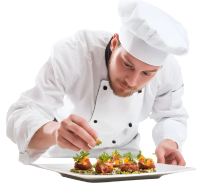 A skilled chef carefully plates an assortment of gourmet appetizers with fresh garnishes for service.