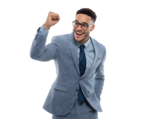 A happy businessman celebrates with a fist pump, showing success and winning.