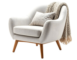 Light beige upholstered armchair with a knitted throw.