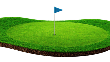 Closeup of golf ball approaching the hole on a lush green course golf