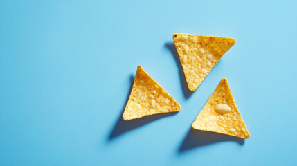 Tortilla Chips Arranged on Bright Blue Background