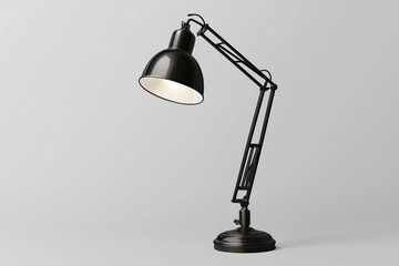 A modern adjustable black metal desk lamp with a bright bulb illuminates a dark background, perfect for reading or office work