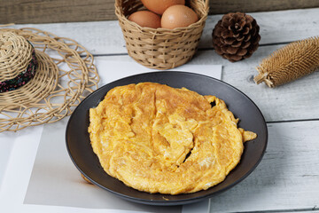 A golden and fluffy Thai-style omelette, or Kai Jeow.