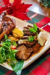 Roasted whole chicken with christmas decoration holiday december snow