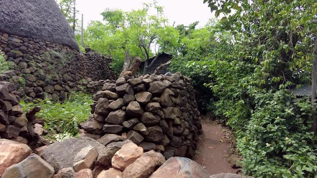 Panning shot of the city walls in Konso, Ethiopia. Konso is famous for it's stone walls and terraced farms.