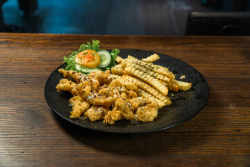 Chicken Plattern Sausage French Fries and sauce