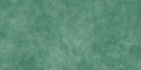 Abstract Elegant dark green background with mottled vintage texture in old fancy background design, texture of colored parchment paper.