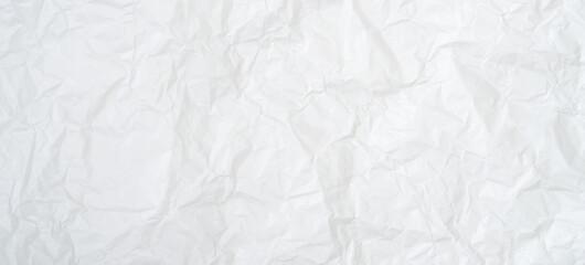 Top view and full frame of wrinkled or crumpled white paper texture used as crumpled white paper background texture in decorative art work