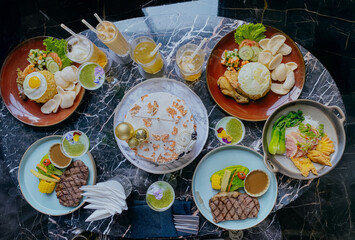 Various dinner served table in restaurant, top view.