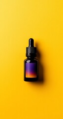 Dropper Bottle with Yellow Background.